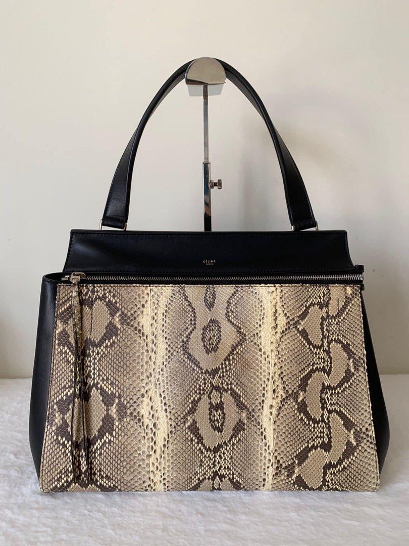 Celine Python Leather Edge Handbag (Category: Luxury Bags & Wallets) located in Manila. Submitted by bagislifeshop (Listing ID 1213159665, Image 1). Description: ▪️Celine Python Leather Edge Handbag▪️ ☑️Available in Pampanga ✅Condition: 8.5/10 ✅Material:Black Smooth Calfskin & Python in SHW ✅Colour: Black/ brown ✅Size: 33.5cm X 17.5cm X 26cm ✅Inclusions: Replacement dustbag .