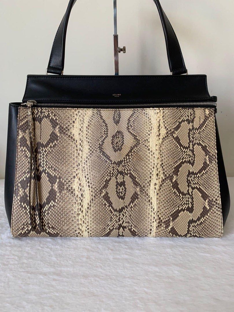 Celine Python Leather Edge Handbag (Category: Luxury Bags & Wallets) located in Manila. Submitted by bagislifeshop (Listing ID 1213159665, Image 2). Description: ▪️Celine Python Leather Edge Handbag▪️ ☑️Available in Pampanga ✅Condition: 8.5/10 ✅Material:Black Smooth Calfskin & Python in SHW ✅Colour: Black/ brown ✅Size: 33.5cm X 17.5cm X 26cm ✅Inclusions: Replacement dustbag .