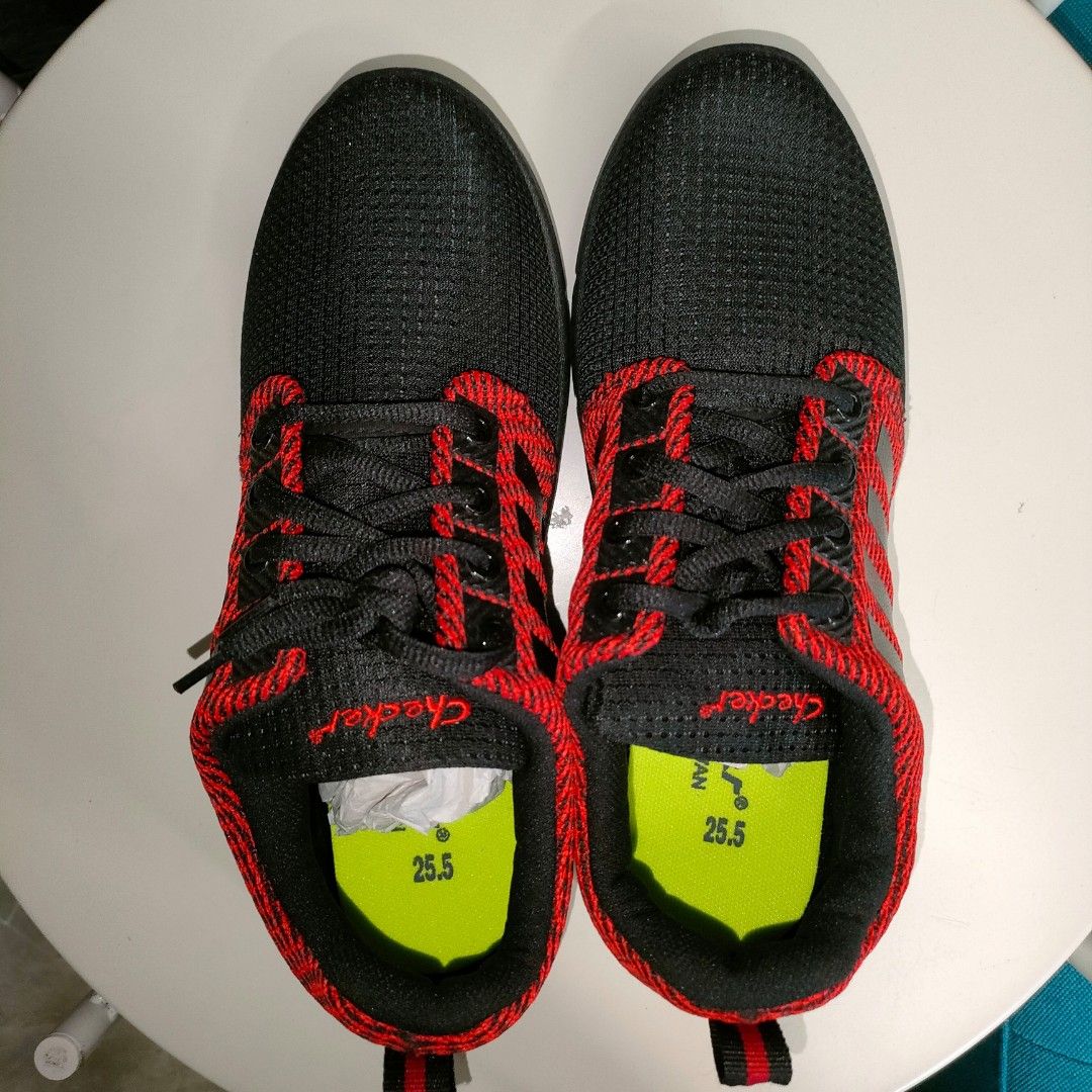 Red and clearance black sports shoes