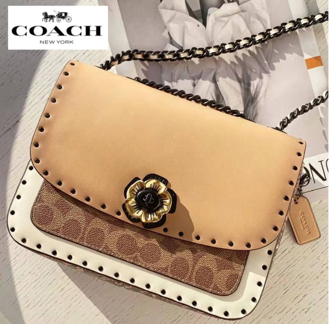Coach parker in signature canvas shop with rivets and snakeskin detail