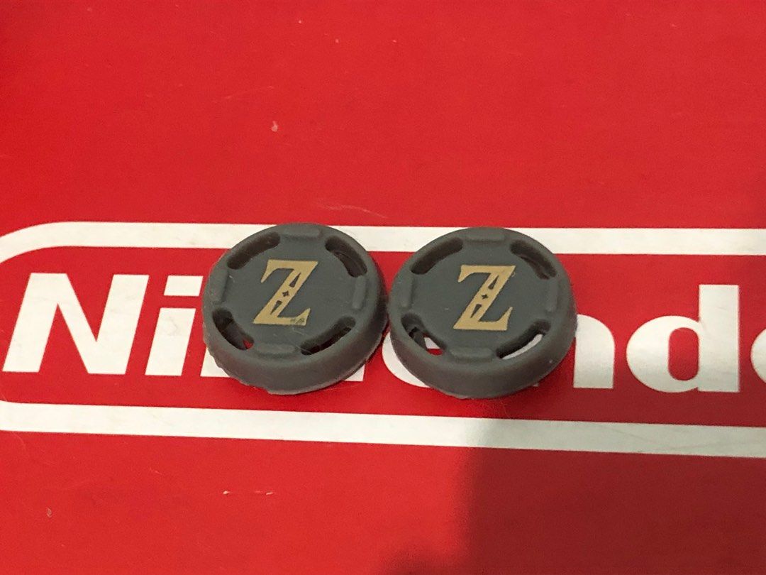 Nintendo Switch Zelda Thumb Grip Caps (Category: Nintendo) located in Quezon City. Submitted by gamespot (Listing ID 1213131649, Image 1). Description: MOP:Gcash Shipping:lalamove/mcfa express (buyer’s expense).