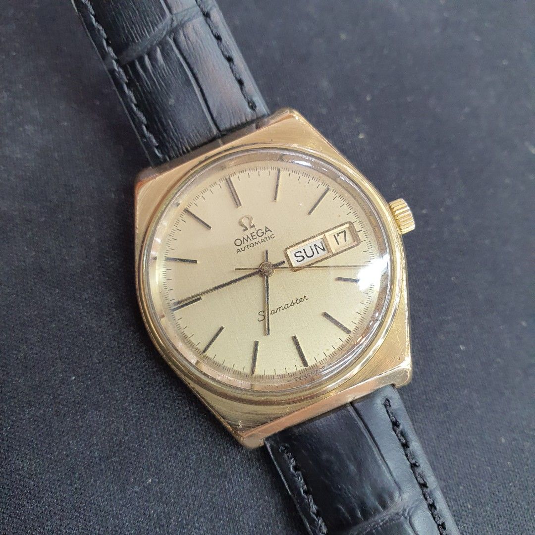 omega seamaster gold day date