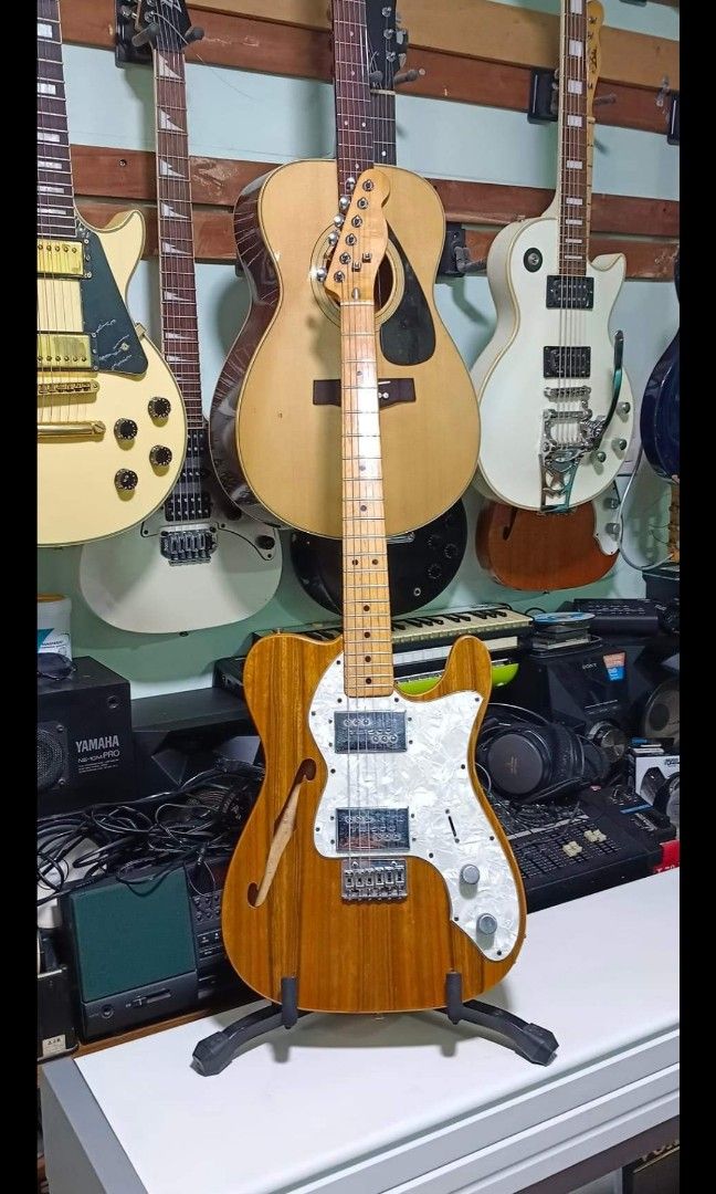 Tiesco rare vintage thinline electric guitar (Category: Musical Instruments) located in Paranaque City. Submitted by tegtegs (Listing ID 1213001637, Image 1). Description: Tiesco thinline electric guitar 38k only Rare vintage With soft case and accessories With with minor Dents scratches only Note. Kayo na mag set up, Okay pick up... 3 way switch: neck,bridge and both(re wire nalang sa back to orig settings) Ganda Ng kahoy, feel at tunog New ligh