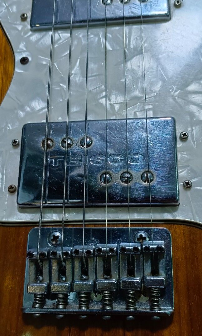 Tiesco thinline electric guitar (Category: Musical Instruments) located in Paranaque City. Submitted by yourhonorvoy (Listing ID 1213002384, Image 3). Description: Tiesco thinline electric guitar 38k only Rare vintage With soft case and accessories With with minor Dents scratches only Note. Kayo na mag set up, Okay pick up... 3 way switch: neck,bridge and both(re wire nalang sa back to orig settings) Ganda Ng kahoy, feel at tunog New light gauge 