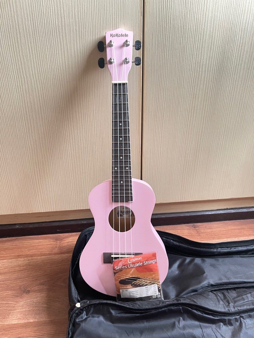 Ukelele (Kokolele) (Category: Musical Instruments) located in Makati City. Submitted by jap_goods (Listing ID 1213088684, Image 1). Description: - Free Clifton bag - Free extra strings (black) - Not used ( Good as new ) - Price negotiable - Good deal for the brand and freebies.