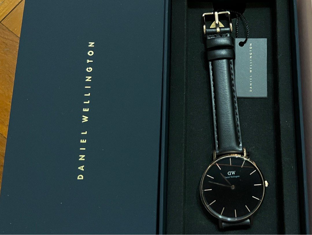 Daniel wellington black new arrivals and rose gold watch