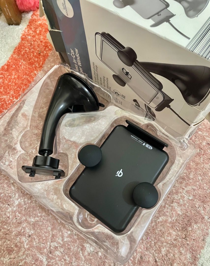Fast Charging Wireless Car Charger 15W for iOS or Android (Category: Chargers & Cables) located in Manila. Submitted by thecluttershop_2018 (Listing ID 1213215674, Image 1). Description: New and unused, just tested with my iPhone 13 and works perfectly well. Rfs: decluttering. With box and manual, box is a bit dusty and worn out due to poor storage.