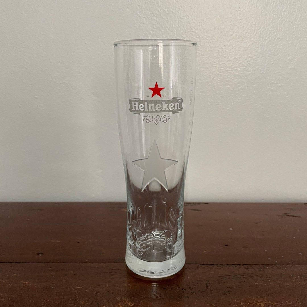 Heineken Embossed beer glass - 250 ml (Category: Water Bottles & Tumblers) located in Manila. Submitted by ozn3rol (Listing ID 1213240230, Image 1). Description: Never used.