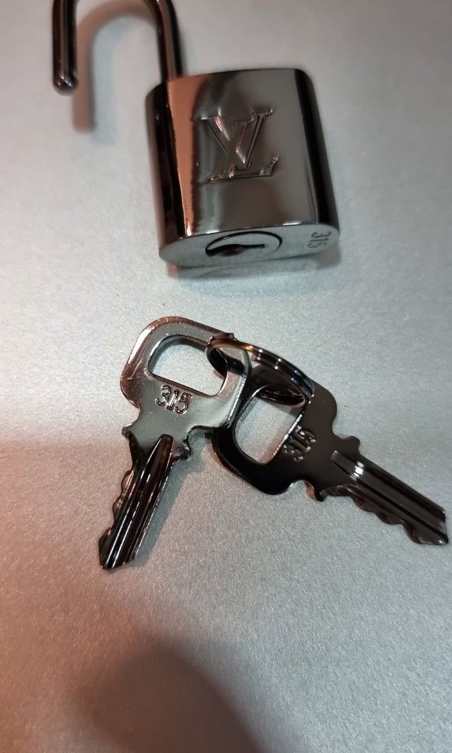 new never used louis vuitton padlock 2 keys Gold hardware Steel