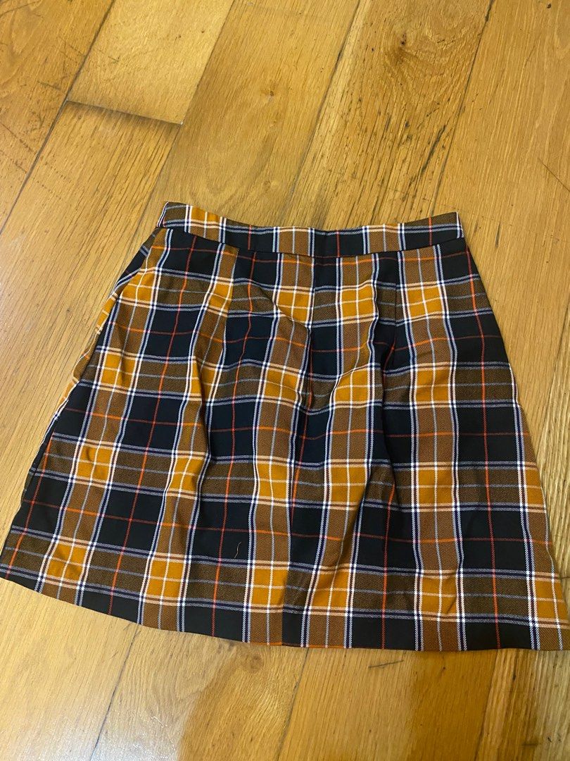 Stradivarius skirt (Category: Skirts) located in Manila. Submitted by kellypickle (Listing ID 1213304011, Image 3). Description: Stradivarius plaid skirt. Issue: 1 button is missing but i used ti pin it when i use it..