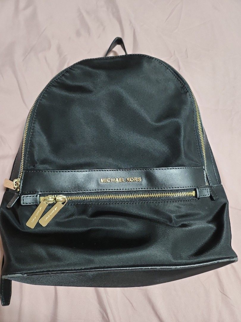 Well used Michael Kors Backpack, Women's Fashion, Bags & Wallets, Backpacks  on Carousell