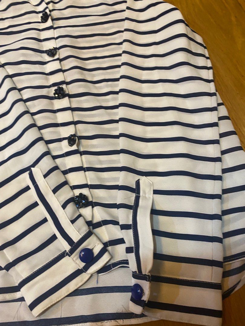Zara women,s top (Category: Longsleeves) located in Manila. Submitted by kellypickle (Listing ID 1213300839, Image 3). Description: Zara polo. Light material. Color: navy blue and white Has this cute beeded buttons. I never used it I just took off the tag and kept it. Small on tag but i think can fot up to M Really nice for work.