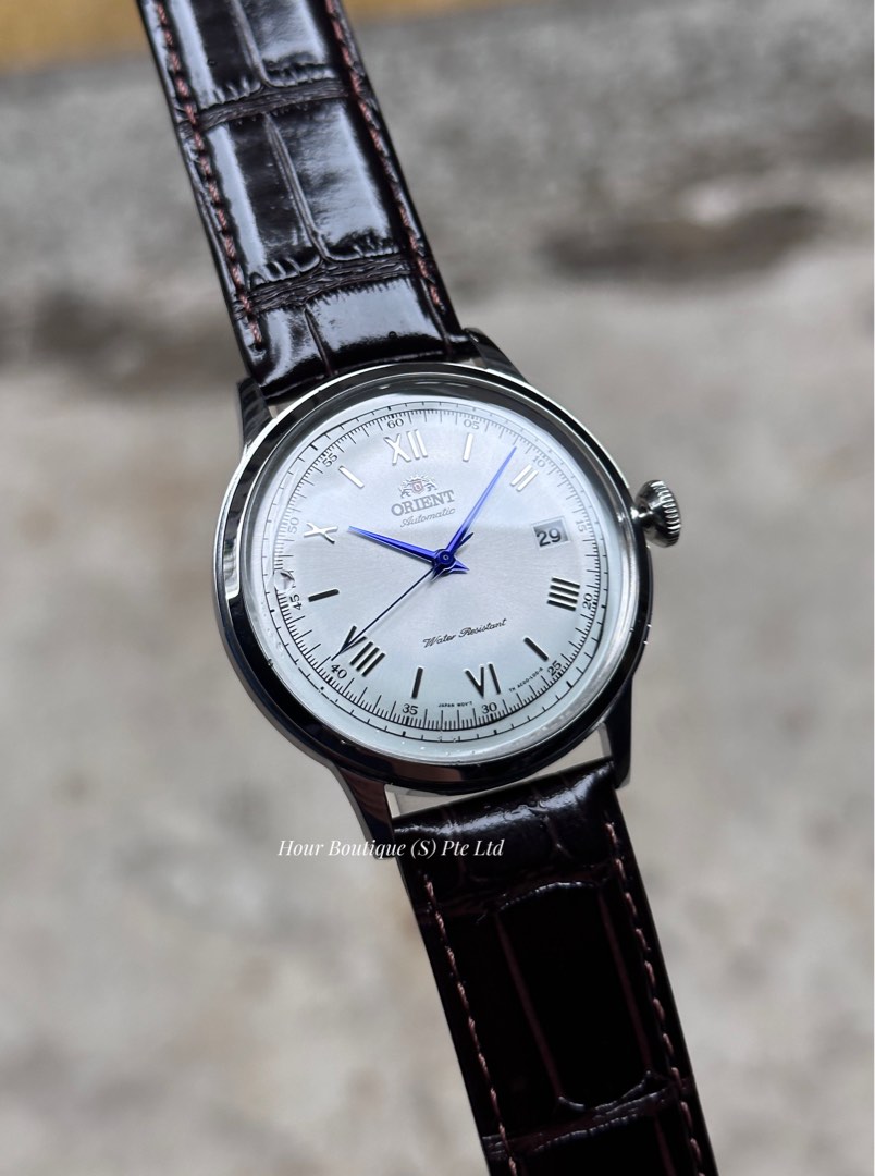 Orient new arrivals blue hands