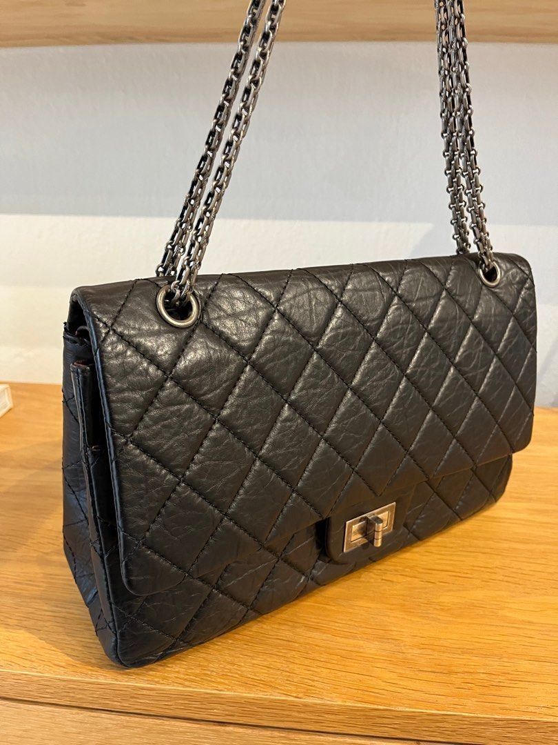 Chanel 2.55 Reissue in black distressed calf leather, Women's Fashion, Bags  & Wallets, Shoulder Bags on Carousell