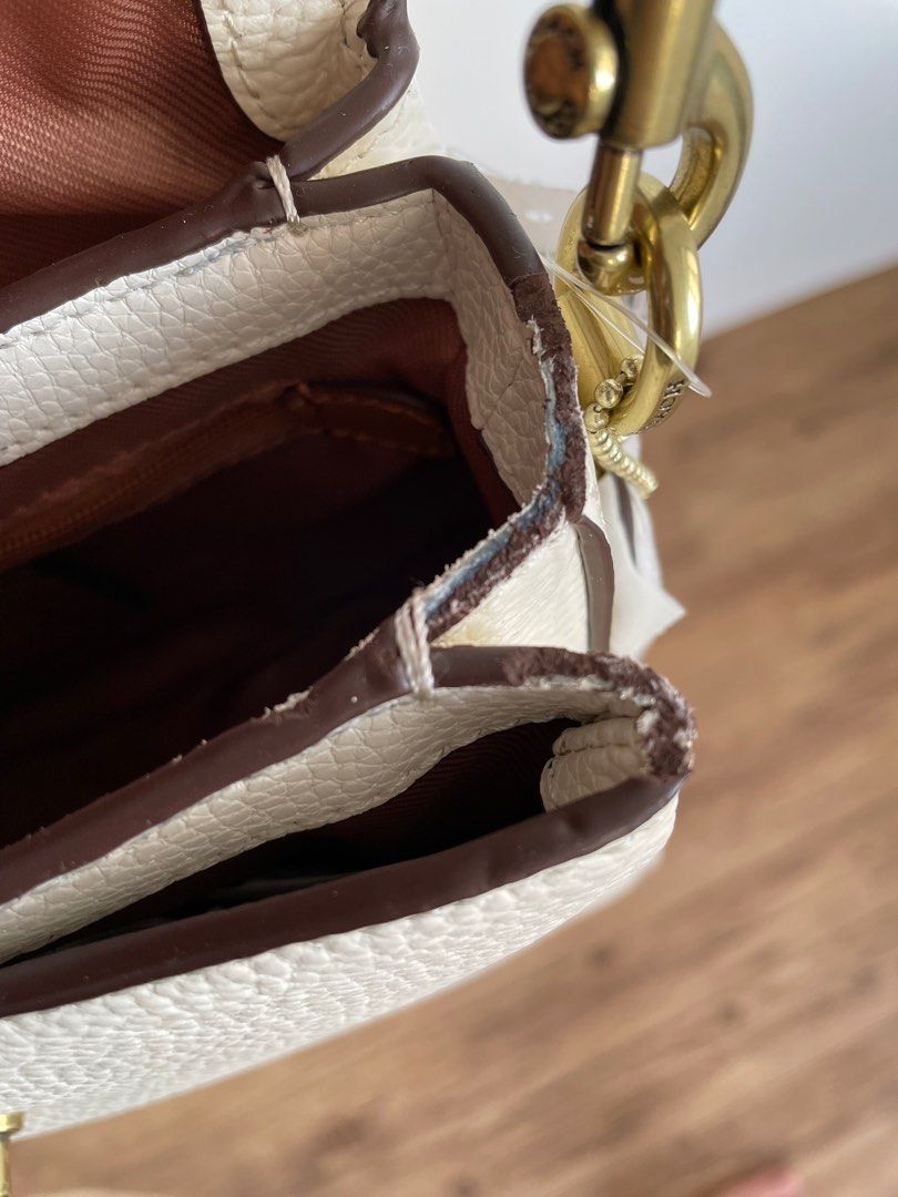Coach Cassie 19 (Category: Luxury Bags & Wallets) located in Makati City. Submitted by rarity_28 (Listing ID 1213466223, Image 3). Description: Vietnam Made Coach Cassie 19 Comes with 3 straps (see last pic for reference) Bought but never used. Straps are still wrapped Flaw: Rubber edge sealing (see 3rd pic) .