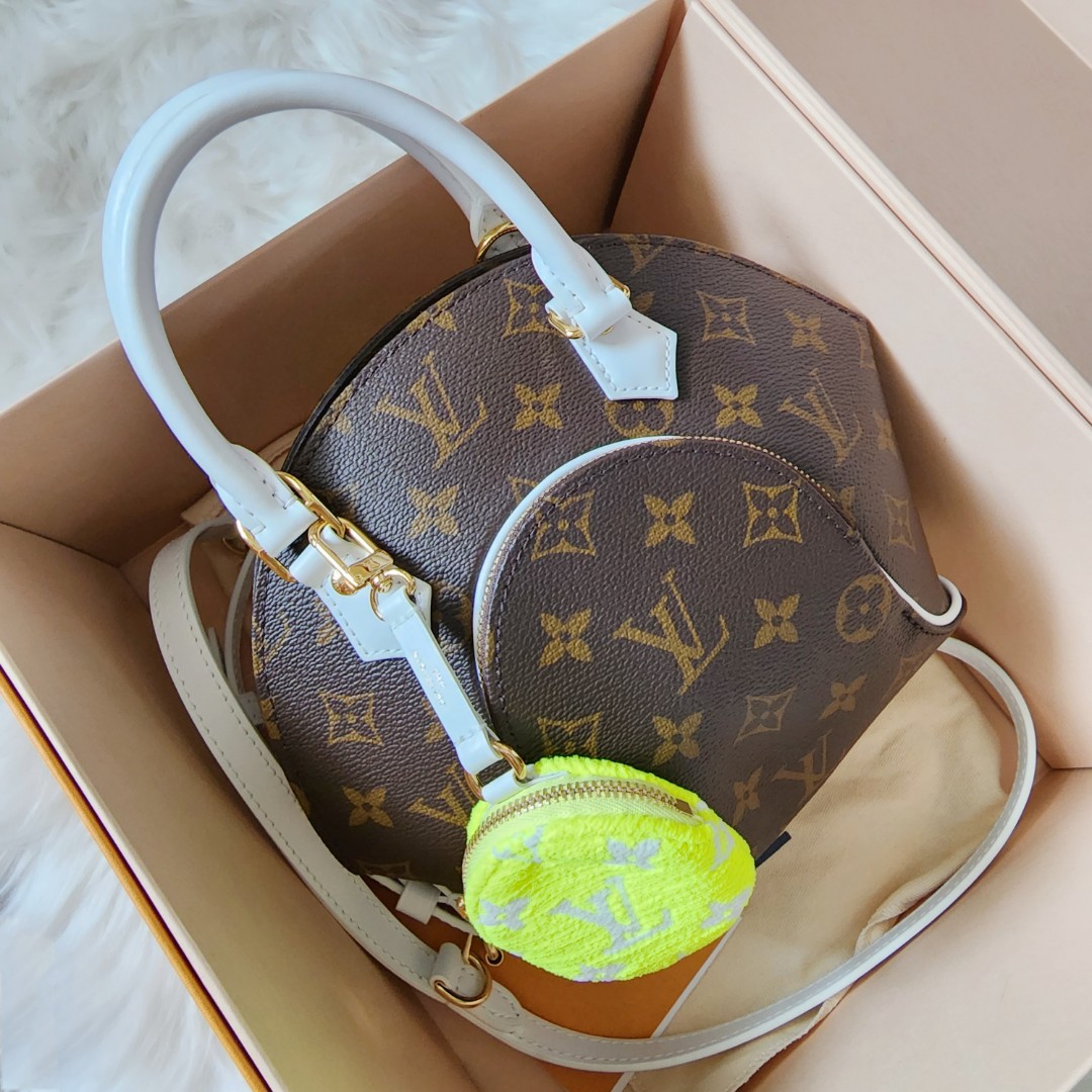 Louis Vuitton, Bags, Louis Vuitton Gaia Bag Tan Detail Discontinued Style  Rare Find