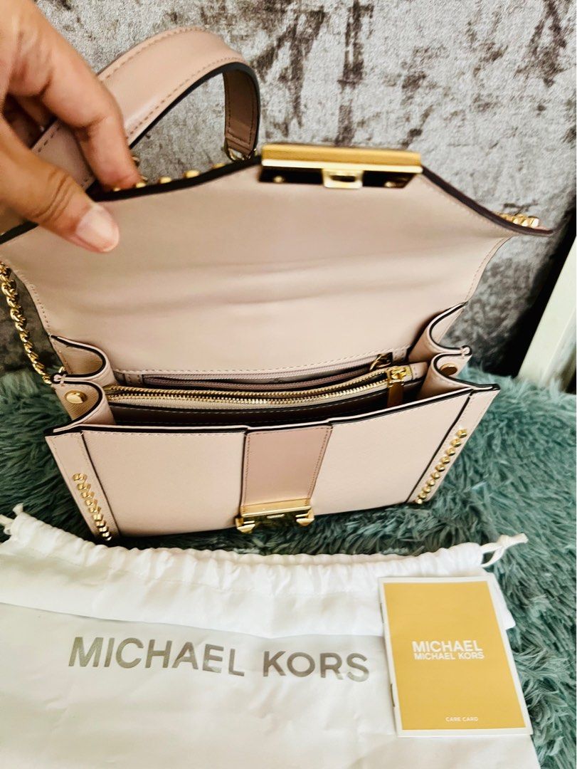 Michael Kors Saffiano leather bag detailed with gold-tone studs and sliding  chain shoulder strap. Designer colour name: Soft Pink, Luxury, Bags &  Wallets on Carousell
