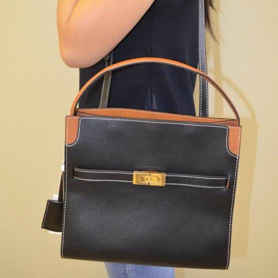 Tory Burch Lee Radziwill Double Bag (Category: Luxury Bags & Wallets) located in Pasig City. Submitted by outletfindsbyara (Listing ID 1190329281, Image 2). Description: - FOR PRE-ORDER; ETA IN 5-7 DAYS (PASABUY FROM THE US) - AUTHENTIC WITH MONEY BACK GUARANTEE (BOUGHT ON SALE AS A LAST PIECE ITEM IN AN OUTLET MALL HENCE THE SLASHED PRICE) - ITEM RETAILS FOR 998 USD ‼️ Item description: - Holds a 13” laptop - Snap stud closures; belted strap wit