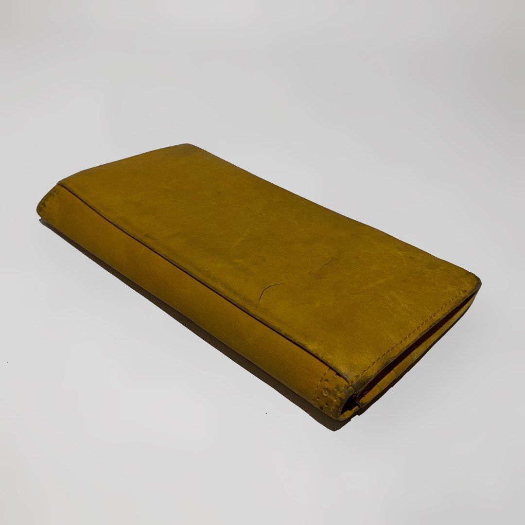 YSL Bifold long wallet (Category: Luxury Bags & Wallets) located in Bacolod City. Submitted by bt_ph (Listing ID 1213448087, Image 2). Description: Authentic YSL long wallet YSL embossed outer design 4 card compartments 1 zip compartment 2 paper bill compartments ykk zip YSL markings Minor sign of usage only.