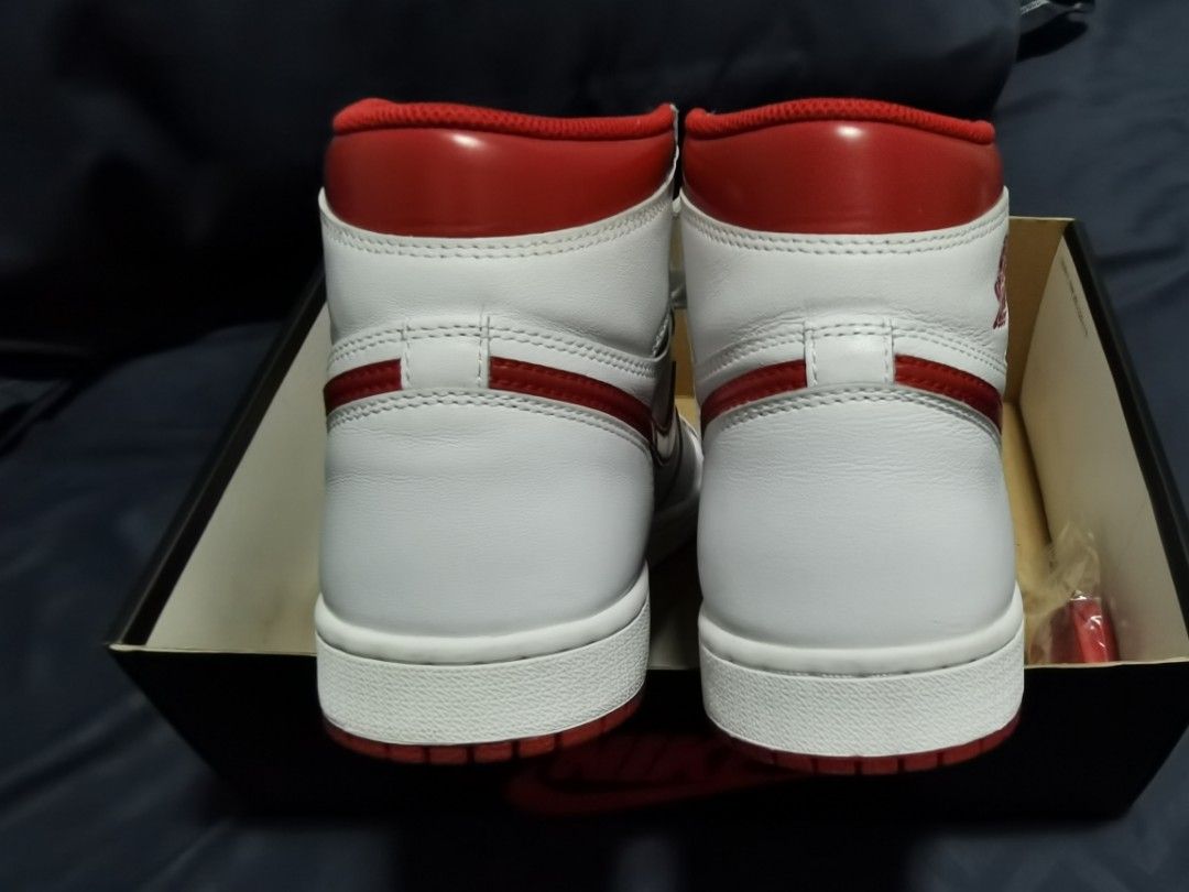 Air Jordan 1 High OG Metallic Red (Category: Sneakers) located in Quezon City. Submitted by jdvgrms (Listing ID 1213626436, Image 3). Description: PRICE IS FIRM For Sale Air Jordan 1 High OG Metallic Red (2017) Size 8 men With box and extra laces No shoe tree but I can provide a replacement Worn 4-6x Still looks new Issue: > Sole separation (due to age) kayo na lang magpareglue 😊 > Erased branding on insole RFS: quitting na ng shoe game Can do m