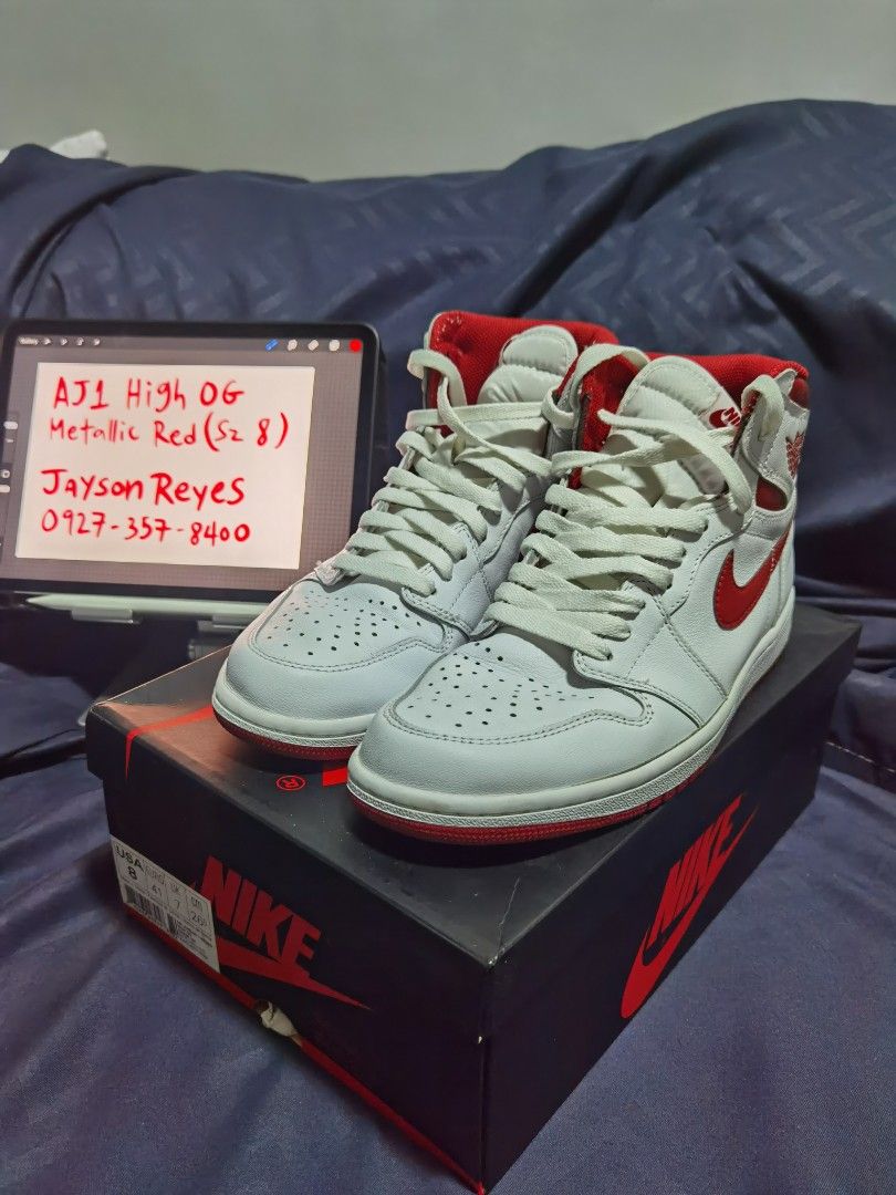 Air Jordan 1 High OG Metallic Red (Category: Sneakers) located in Quezon City. Submitted by jdvgrms (Listing ID 1213626436, Image 2). Description: PRICE IS FIRM For Sale Air Jordan 1 High OG Metallic Red (2017) Size 8 men With box and extra laces No shoe tree but I can provide a replacement Worn 4-6x Still looks new Issue: > Sole separation (due to age) kayo na lang magpareglue 😊 > Erased branding on insole RFS: quitting na ng shoe game Can do m