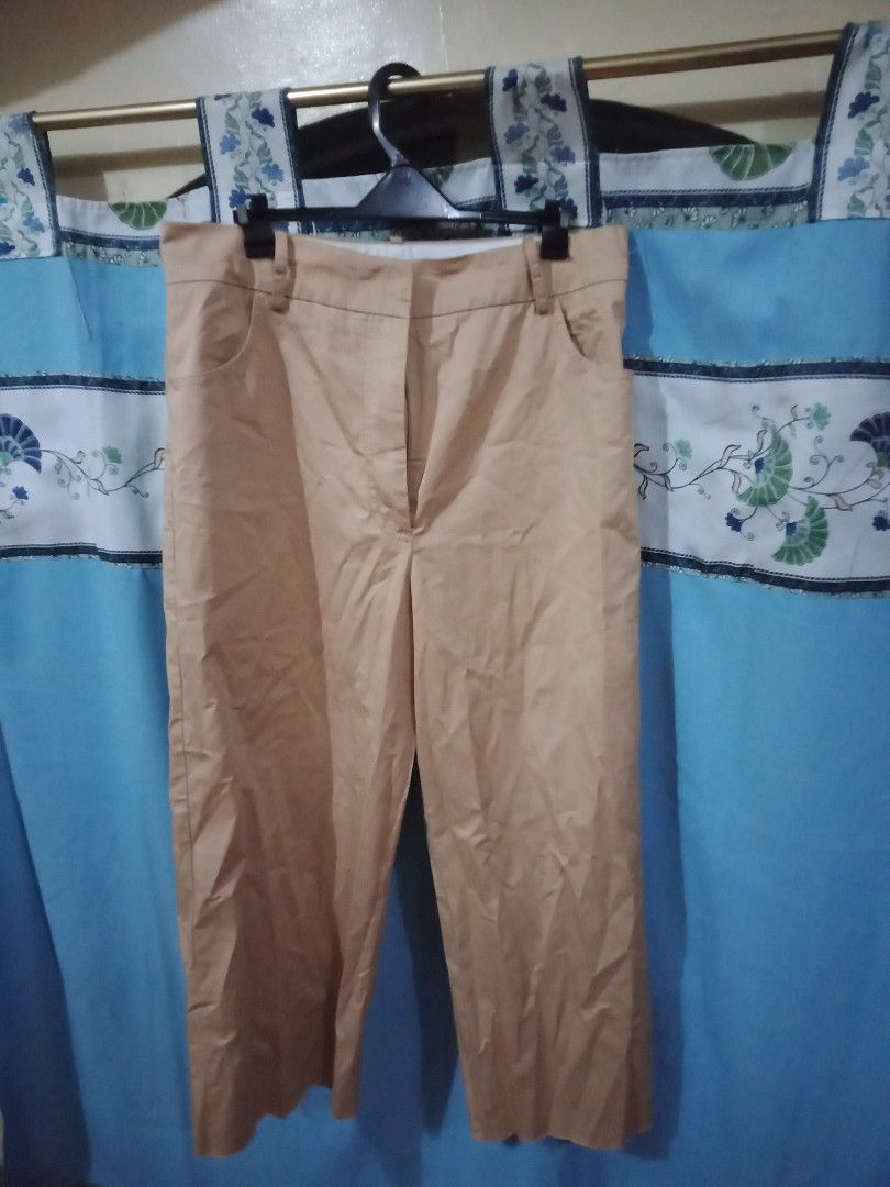 Cream Brown Straight Pants (Category: Other Bottoms) located in Paranaque City. Submitted by _andreaaaa13 (Listing ID 1213764552, Image 1). Description: Cream Brown Straight Pants - In good condition - Altered bottom part Size Frame: Medium to Large.