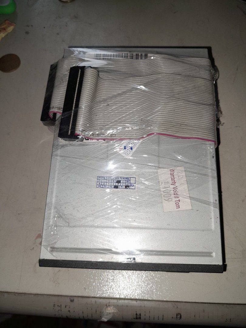 FLOPPY DISK (Category: Computer Parts) located in Kuala Lumpur. Submitted by kuganselva (Listing ID 1213608435, Image 2). Description: WELL USED FULL TESTED AND WORKING CONDITION . COMES WITH FREE CABLE.