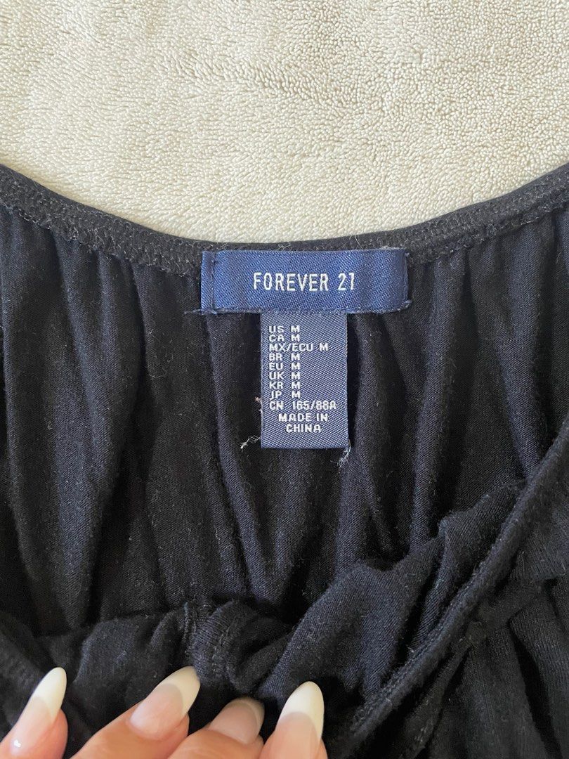 Forever 21 Top (Category: Blouses) located in Las Pinas. Submitted by polinegrc (Listing ID 1213613759, Image 3). Description: strechable fabric medium size no flaws no ww.