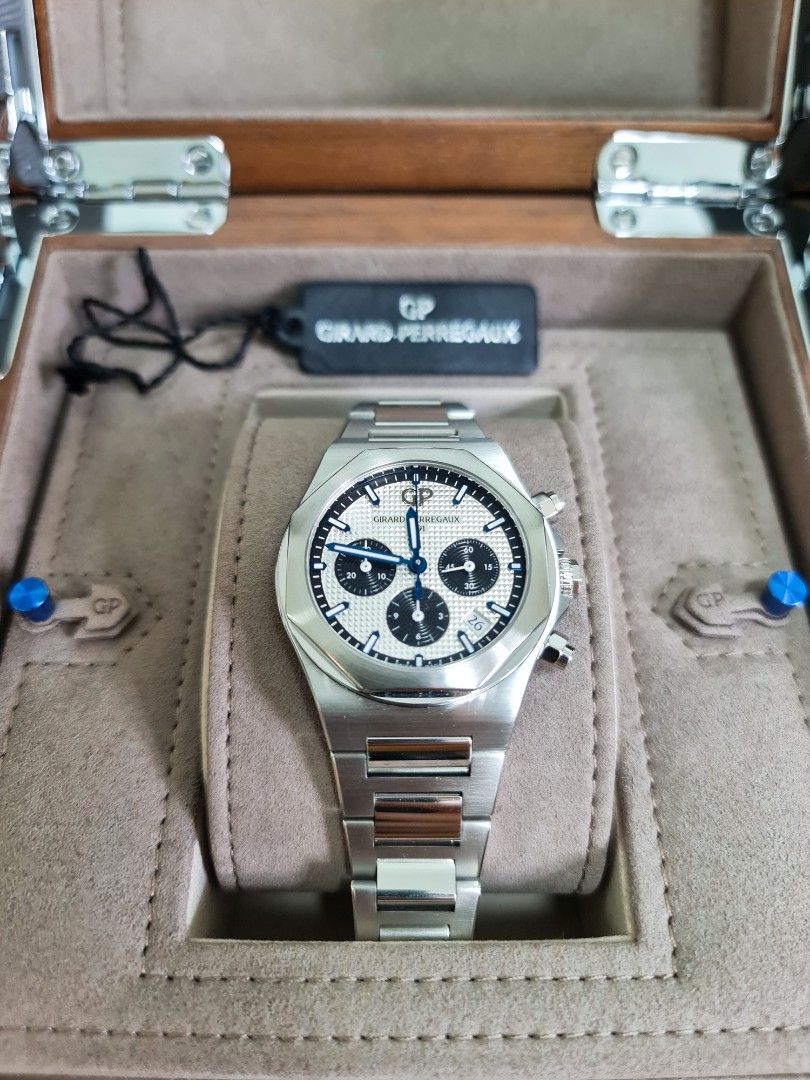 Girard Perregaux Laureato Chronograph 38mm (Category: Watches) located in Singapore. Submitted by timewonders (Listing ID 1205226877, Image 3). Description: GP Laureato Chronograph 38MM Model : 81040-11-131-11A Dial size : 38mm with stamped Clous de Paris pattern Bracelet : 904l Thickness : 11mm Movement : GP 3300-0135/38 calibre 4hz frequency with 46 hour power reserve Full set with brand new leather strap, rubber strap & deployment clasp.