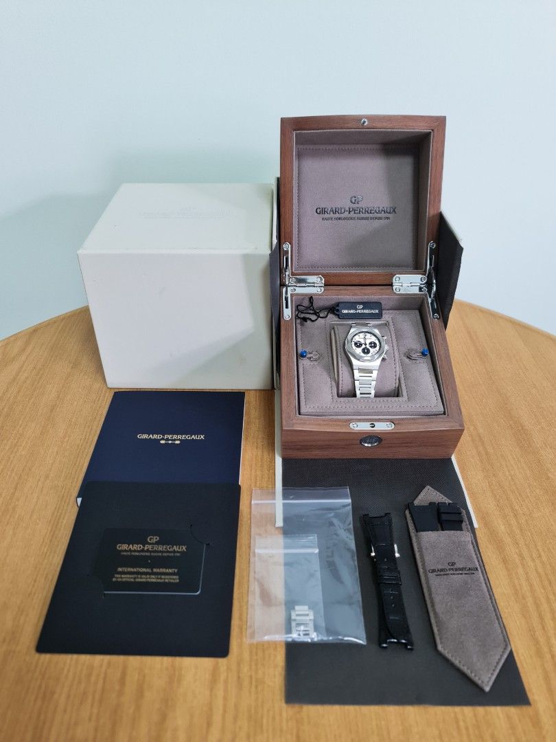 Girard Perregaux Laureato Chronograph 38mm (Category: Watches) located in Singapore. Submitted by timewonders (Listing ID 1205226877, Image 1). Description: GP Laureato Chronograph 38MM Model : 81040-11-131-11A Dial size : 38mm with stamped Clous de Paris pattern Bracelet : 904l Thickness : 11mm Movement : GP 3300-0135/38 calibre 4hz frequency with 46 hour power reserve Full set with brand new leather strap, rubber strap & deployment clasp.