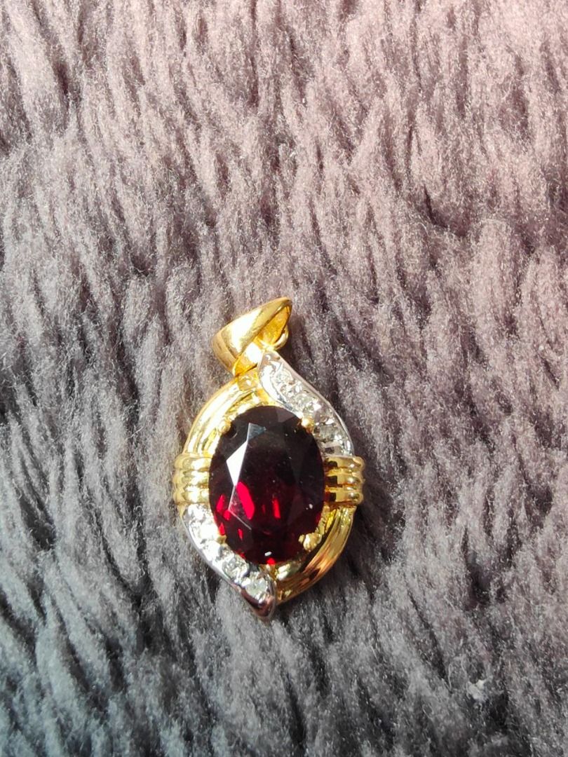 Garnet and shop diamond pendant