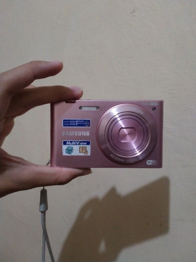 RARE FLIP SCREEN samsung mv900f digital camera (Category: Cameras) located in Pasig City. Submitted by lovepinkthings (Listing ID 1213626721, Image 2). Description: - negotiable for sure buyer!! - can flip it's screen - touchscreen! inclusions: unit battery charger sd card strap freebies.