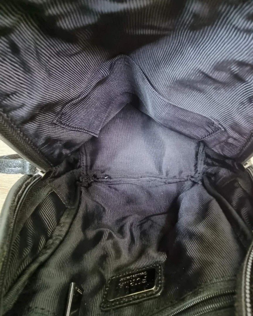 Authentic FURLA backpack mini (Category: Luxury Bags & Wallets) located in Quezon City. Submitted by manerarestorationservices (Listing ID 1213894464, Image 2). Description: SALE SALE SALE❗️❗️❗️10,500php 🧼🧿8,800PHP🧿🧼 Money back Guarantee 💯% Guaranteed authentic *Brand: FURLA *Color: BLACK CALFSKIN *Size: MINI *Condition: 8/10 HAS NEVER BEEN SPA -Used * Inclusions: BAG WITH PROVIDED Dustbag 10 : Brand-new or New with tag 9 : Like new,only use