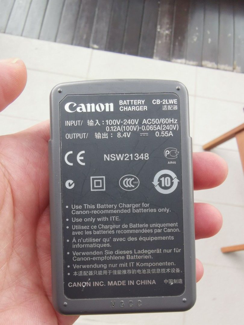Canon camera battery charger, Photography, Cameras on Carousell