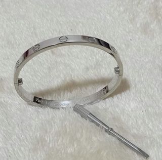 Cartier bangle with screw