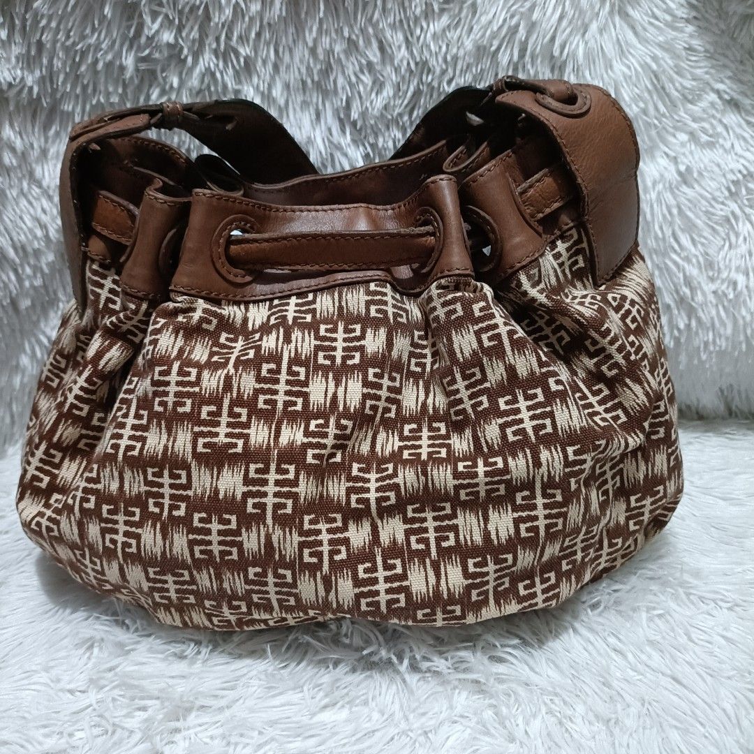 Coded Givenchy Canvas and Leather Hobo Bag (Category: Luxury Bags & Wallets) located in Manila. Submitted by Maykelyn4723 (Listing ID 1213779587, Image 2). Description: Dimensions: Height-11 1/2 in. x Length: 12 in. x Base Width: 5 1/2 in..
