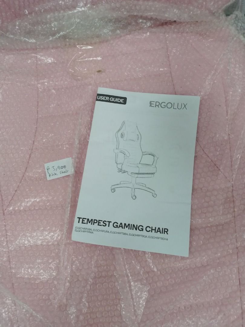 Ergolux Tempest Gaming Chair (Pink/White) (Category: Chairs) located in Muntinlupa City. Submitted by aussiesurplus (Listing ID 1213860295, Image 3). Description: Ergolux Tempest Gaming Chair (Pink/White) Surplus from Australia Price: P5,900 ✔️Ideal for office use or gaming ✔️360° Swivel with up to 155° chair locking angle ✔️Rocking range up to 25° ✔️Contoured backrest with cushioned headrest support ✔️Retractable padded footrest – kick your feet