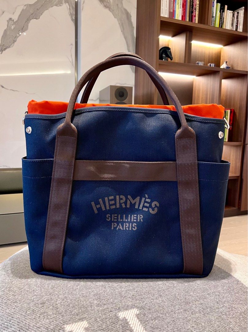 Bonhams : Hermès a Bleu Navy and Feu Canvas Panasage Grooming Bag 2022  (includes dust bags and box)