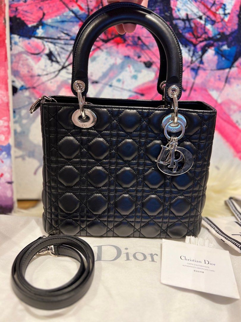 Lady Dior Medium size (Category: Luxury Bags & Wallets) located in San Fernando. Submitted by bagella_co (Listing ID 1213775270, Image 1). Description: CD Lady Dior Black calf leather Silver Hardware Medium Size Rank A Inclusions: Dust Bag, Authenticcity card and sling strap.