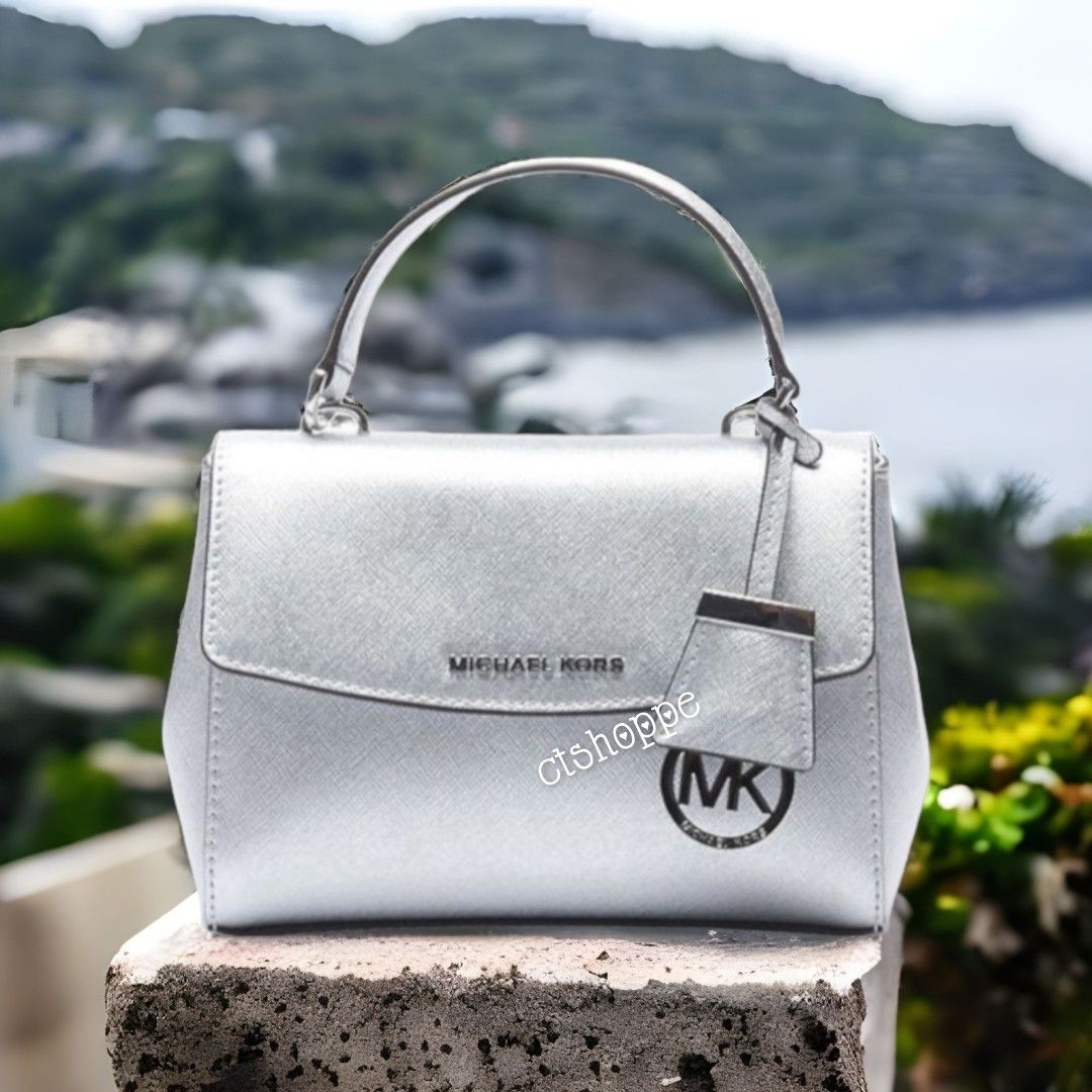 Michael Kors Ava Extra Small Saffiano Leather Crossbody Sling Handbag,  Women's Fashion, Bags & Wallets, Cross-body Bags on Carousell