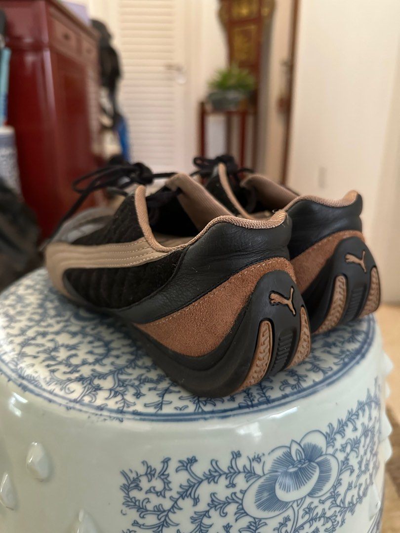 Black and brown puma shoes discount