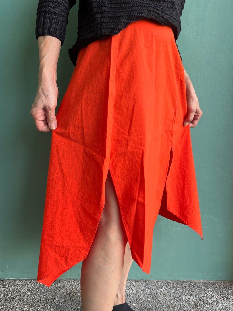AERON Orange Asymmetrical Skirt (Category: Skirts) located in Quezon City. Submitted by lolaandrogynous (Listing ID 1213983952, Image 2). Description: AERON Orange Asymmetrical Skirt. Size 34cm. Used only once. Like NEW. 100% Cotton. Made in Hungary. Only 5150 Php.