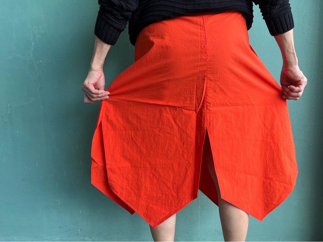 AERON Orange Asymmetrical Skirt (Category: Skirts) located in Quezon City. Submitted by lolaandrogynous (Listing ID 1213983952, Image 3). Description: AERON Orange Asymmetrical Skirt. Size 34cm. Used only once. Like NEW. 100% Cotton. Made in Hungary. Only 5150 Php.