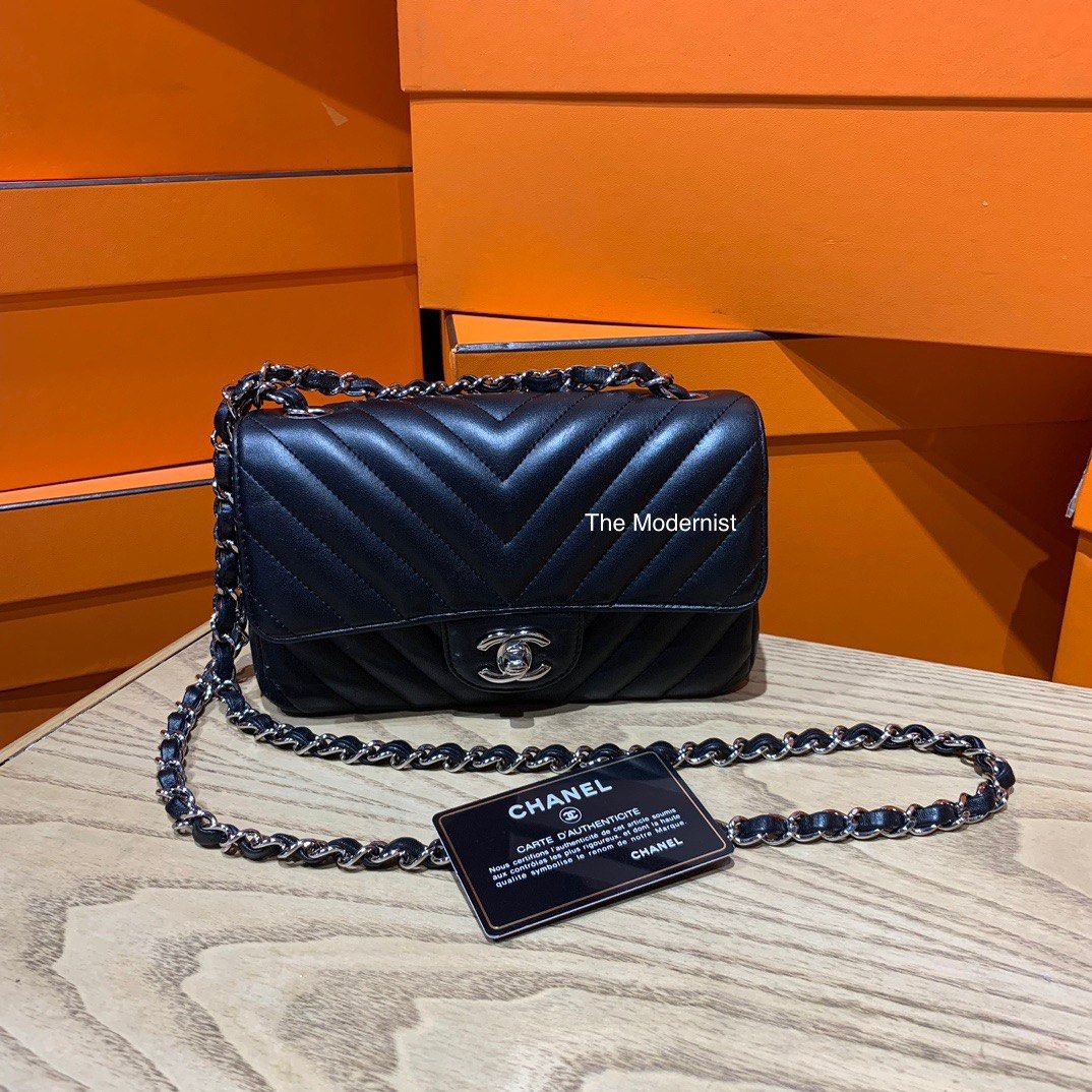 Chanel Chevron Quilted Rectangular Mini Flap Bag in Black Lambskin with  Shiny Silver Hardware - SOLD