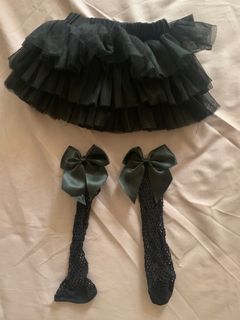 Black tutu skirt & fishnet knee-high socks