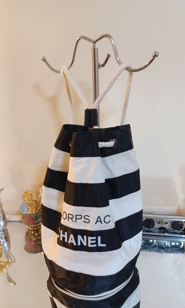 💜💕Chanel Le Corps Actif Border Pattern Mini Drawstring Backpack Bag (Category: Luxury Bags & Wallets) located in Quezon City. Submitted by wheremyheart_is (Listing ID 1214152299, Image 1). Description: <item is available as long as posted> *auth-orig.,ultra rare collector must own vintage novelty collection piece, well-loved con.,sign of usage, minimal canvas drawstring wear hence selling low,mini>approx.: 23x26x15cm lhw,canvas & nylon combi,bl