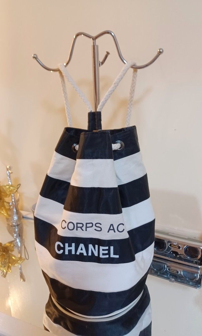 💜💕Chanel Le Corps Actif Border Pattern Mini Drawstring Backpack Bag (Category: Luxury Bags & Wallets) located in Quezon City. Submitted by wheremyheart_is (Listing ID 1214152299, Image 3). Description: <item is available as long as posted> *auth-orig.,ultra rare collector must own vintage novelty collection piece, well-loved con.,sign of usage, minimal canvas drawstring wear hence selling low,mini>approx.: 23x26x15cm lhw,canvas & nylon combi,bl
