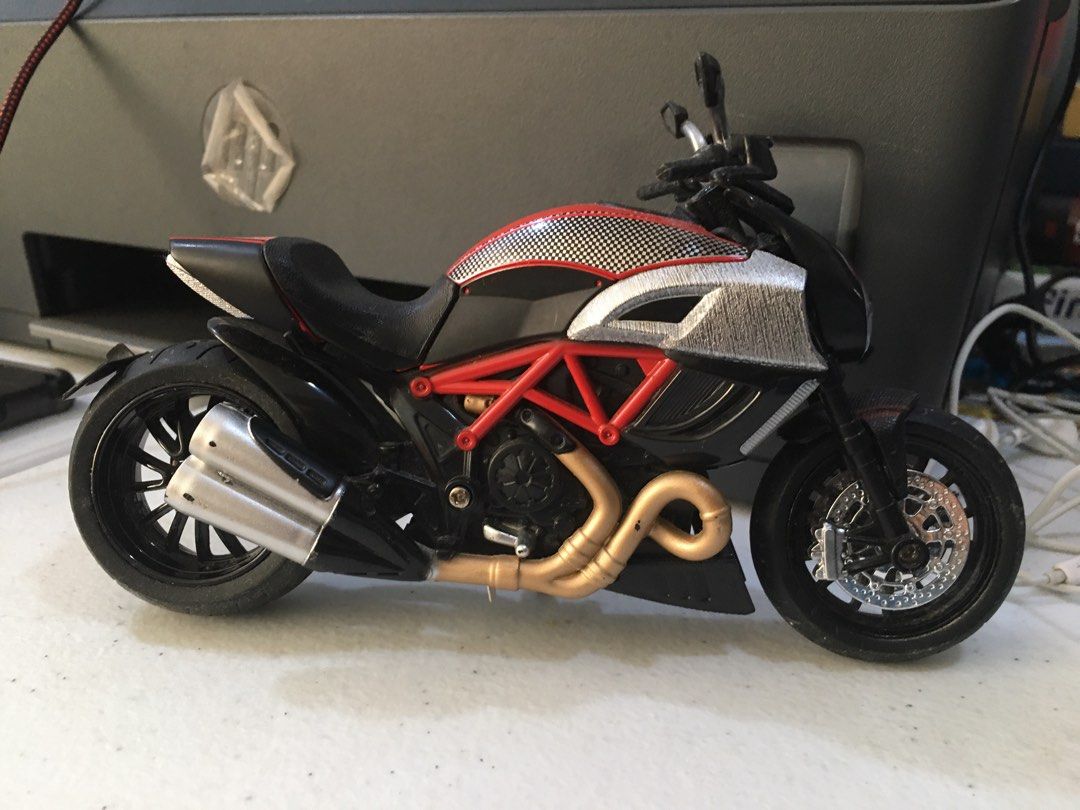 Ducati Motorcycle Toy (Category: Vehicle & Diecast Models) located in Manila. Submitted by 888ejwright (Listing ID 1213984840, Image 3). Description: Used this to match my Red Hood action figure.