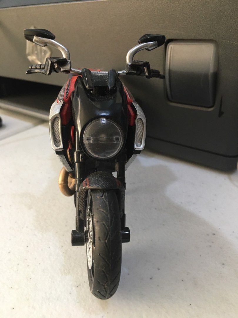 Ducati Motorcycle Toy (Category: Vehicle & Diecast Models) located in Manila. Submitted by 888ejwright (Listing ID 1213984840, Image 2). Description: Used this to match my Red Hood action figure.