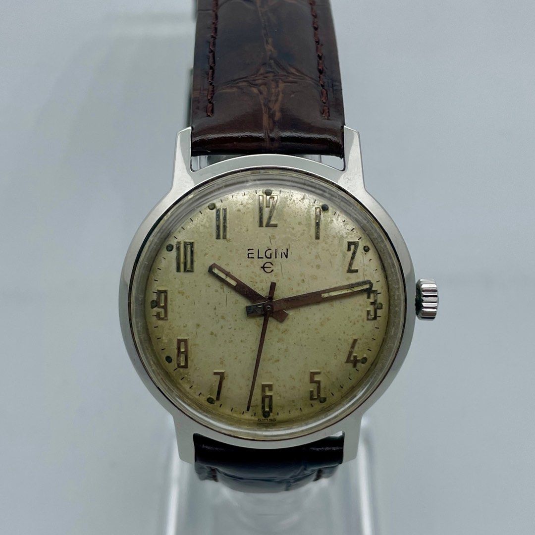Elgin American Vintage Wind (Category: Men's Watches) located in Manila. Submitted by ozn3rol (Listing ID 1214136279, Image 1). Description: ELGIN American Vintage Hand Wind Case size: 34mm Lug width: 18mm Thickness: 10.5mm Signed Elgin Crown Newly serviced Keeps great time New brown leather strap “During its one-hundred-year history, Elgin produced around 60 million timepieces—ranging from military and pocket watches to exquisite art deco pieces